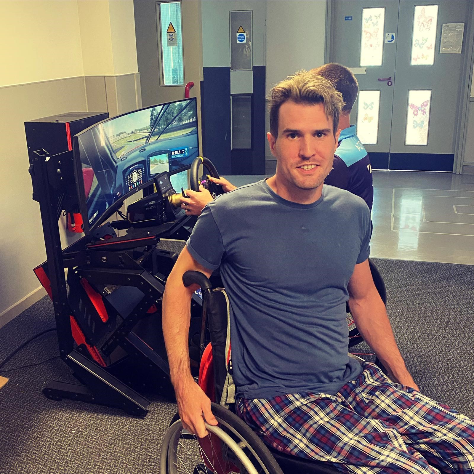 Spinal injury patients experience life as a racing driver thanks to Team BRIT